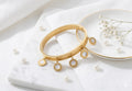 Gold-Tone Roman Numeral Charm Hand-Cuff
